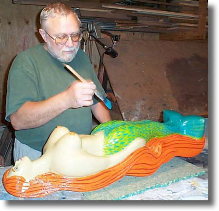 Process of carving a custom figurehead by Carved Wood Signs