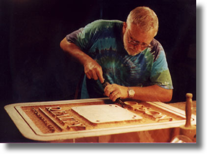 Process of carving a custom wood sign by Carved Wood Signs