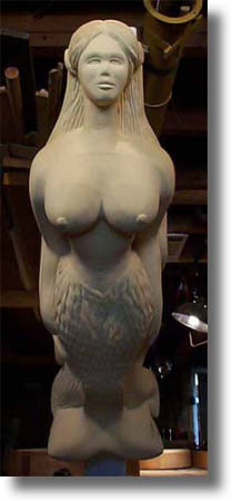 Process of carving a custom figurehead by Carved Wood Signs