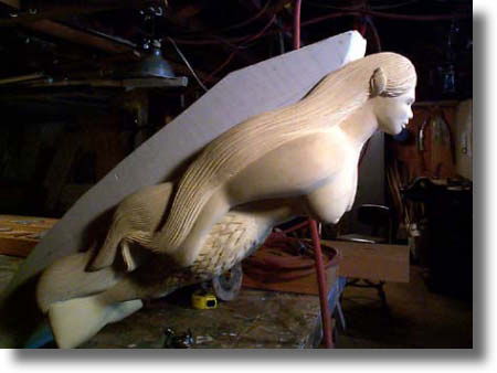 Process of carving a custom figurehead by Carved Wood Signs