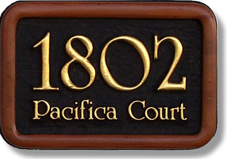 Carved Wood house sign