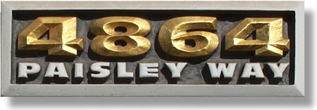 Carved Wood house sign