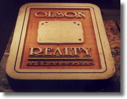 Process of carving a custom wood sign by Carved Wood Signs