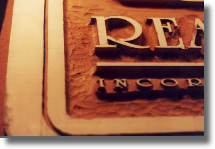 Process of carving a custom wood sign by Carved Wood Signs
