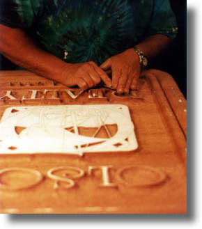Process of carving a custom wood sign by Carved Wood Signs